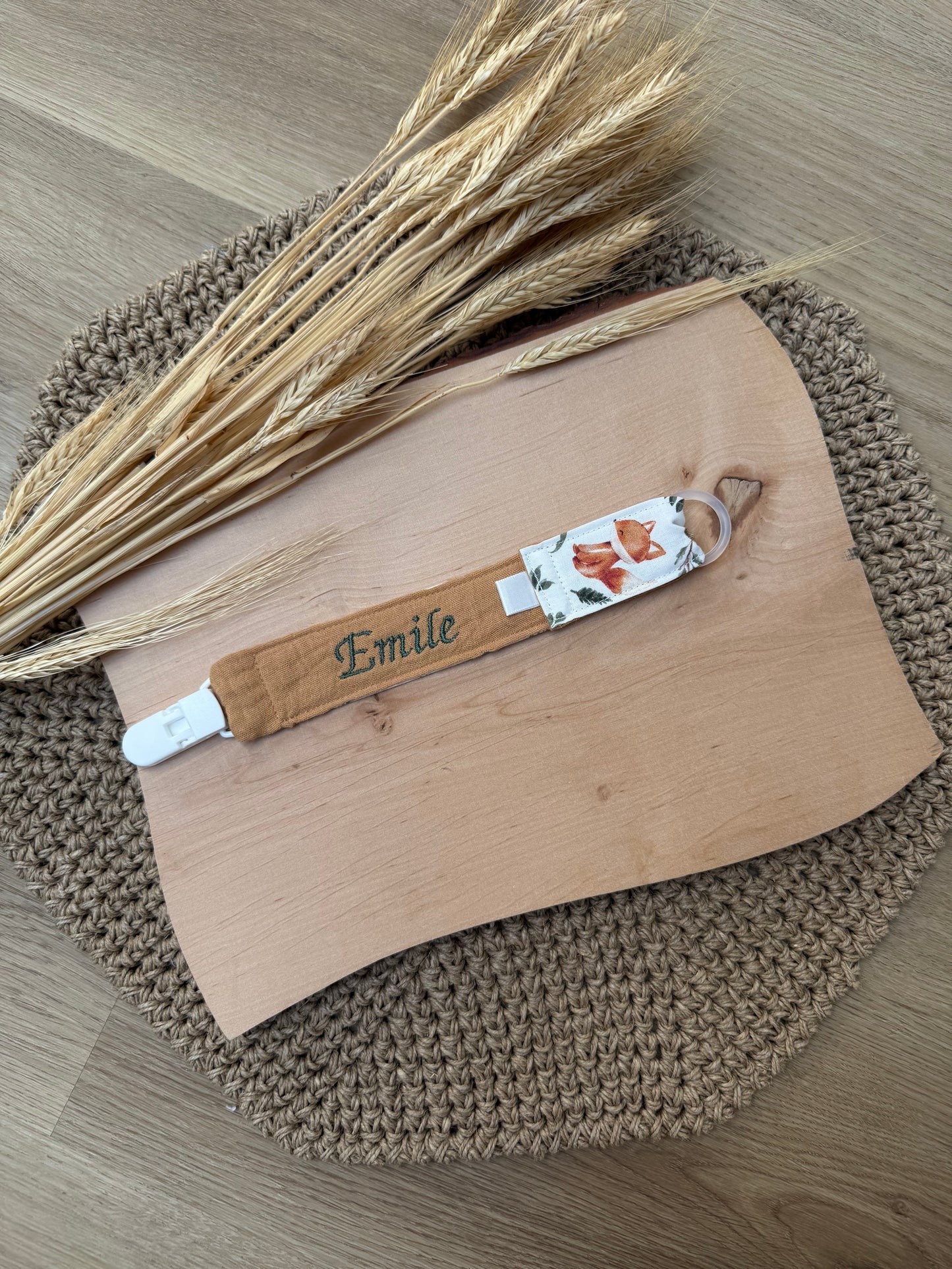 Attache tétine bi-tissu